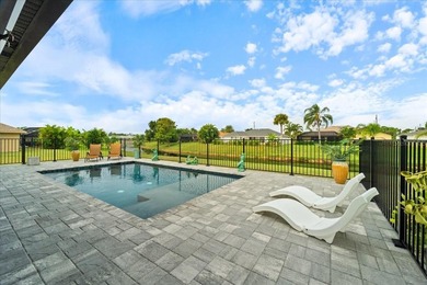 Welcome to your dream home on a freshwater canal in the highly on Pinemoor West Golf Club in Florida - for sale on GolfHomes.com, golf home, golf lot