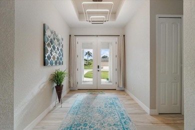 Welcome to your dream home on a freshwater canal in the highly on Pinemoor West Golf Club in Florida - for sale on GolfHomes.com, golf home, golf lot