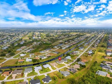 Welcome to your dream home on a freshwater canal in the highly on Pinemoor West Golf Club in Florida - for sale on GolfHomes.com, golf home, golf lot