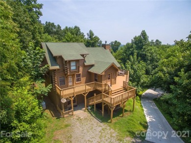 Deer Meadow is a turnkey 3 bedroom, 3 bath vacation rental cabin on Lake Lure Municipal Golf Course in North Carolina - for sale on GolfHomes.com, golf home, golf lot