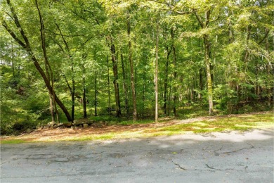 This .92-acre golf lot is nestled within the gates of Reynolds on Reynolds Lake Oconee - The Oconee in Georgia - for sale on GolfHomes.com, golf home, golf lot