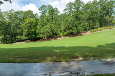 This .92-acre golf lot is nestled within the gates of Reynolds on Reynolds Lake Oconee - The Oconee in Georgia - for sale on GolfHomes.com, golf home, golf lot