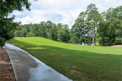This .92-acre golf lot is nestled within the gates of Reynolds on Reynolds Lake Oconee - The Oconee in Georgia - for sale on GolfHomes.com, golf home, golf lot