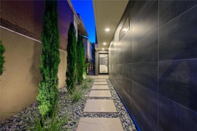 Indulge in luxurious living at this barely lived in, 2022 build on Las Vegas Country Club in Nevada - for sale on GolfHomes.com, golf home, golf lot