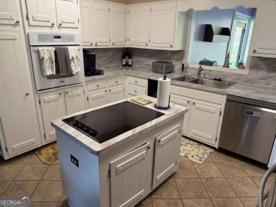 Wonderfully maintained and perfectly located, this 4 bedroom, 2 on Honey Creek Country Club in Georgia - for sale on GolfHomes.com, golf home, golf lot
