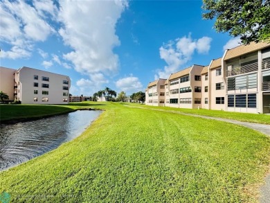 This inviting 55+ community condo offers an exceptional blend of on Sunrise Lakes Phase IV Golf Course in Florida - for sale on GolfHomes.com, golf home, golf lot