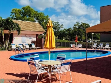 This inviting 55+ community condo offers an exceptional blend of on Sunrise Lakes Phase IV Golf Course in Florida - for sale on GolfHomes.com, golf home, golf lot