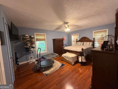 Wonderfully maintained and perfectly located, this 4 bedroom, 2 on Honey Creek Country Club in Georgia - for sale on GolfHomes.com, golf home, golf lot