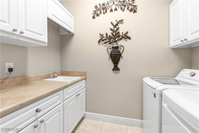 FEATURING BOTH A GOLF COURSE AND WATER VIEWS.  This home has on Verandah Golf Course and Club in Florida - for sale on GolfHomes.com, golf home, golf lot