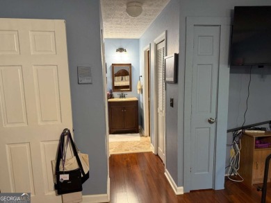 Wonderfully maintained and perfectly located, this 4 bedroom, 2 on Honey Creek Country Club in Georgia - for sale on GolfHomes.com, golf home, golf lot