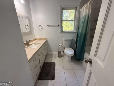 Wonderfully maintained and perfectly located, this 4 bedroom, 2 on Honey Creek Country Club in Georgia - for sale on GolfHomes.com, golf home, golf lot