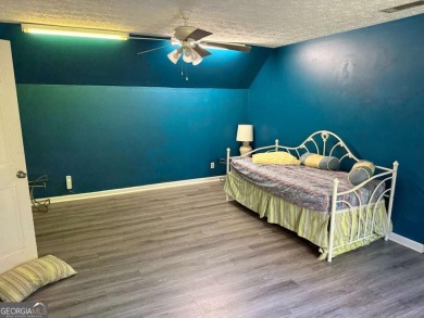 Wonderfully maintained and perfectly located, this 4 bedroom, 2 on Honey Creek Country Club in Georgia - for sale on GolfHomes.com, golf home, golf lot