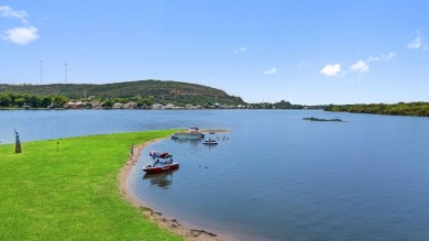 What a cool place on the lake! 115 Firecracker Lane has great on Legends Golf Course in Texas - for sale on GolfHomes.com, golf home, golf lot