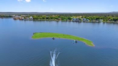 What a cool place on the lake! 115 Firecracker Lane has great on Legends Golf Course in Texas - for sale on GolfHomes.com, golf home, golf lot