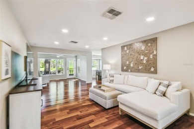 Step into Florida living at its finest with this beautifully on Highland Lakes Executive Golf Course in Florida - for sale on GolfHomes.com, golf home, golf lot