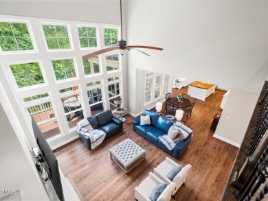 Step into refined luxury with this 6 bed / 5 bath estate on TPC at Wakefield Plantation in North Carolina - for sale on GolfHomes.com, golf home, golf lot