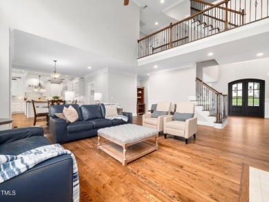 Step into refined luxury with this 6 bed / 5 bath estate on TPC at Wakefield Plantation in North Carolina - for sale on GolfHomes.com, golf home, golf lot