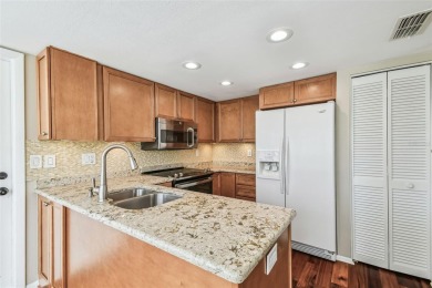 Step into Florida living at its finest with this beautifully on Highland Lakes Executive Golf Course in Florida - for sale on GolfHomes.com, golf home, golf lot