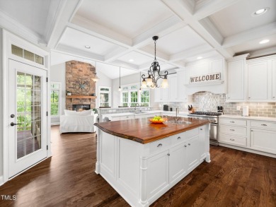 Step into refined luxury with this 6 bed / 5 bath estate on TPC at Wakefield Plantation in North Carolina - for sale on GolfHomes.com, golf home, golf lot