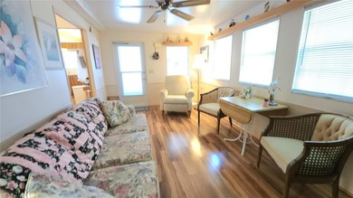 SO MUCH TO OFFER IN THIS ONE BEDROOM, 1 1/2 BATH MOBILE HOME IN on River Run Golf Links in Florida - for sale on GolfHomes.com, golf home, golf lot