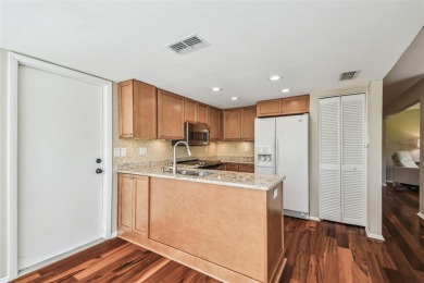 Step into Florida living at its finest with this beautifully on Highland Lakes Executive Golf Course in Florida - for sale on GolfHomes.com, golf home, golf lot
