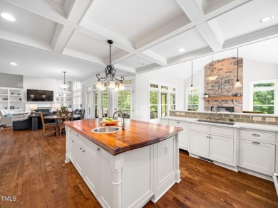 Step into refined luxury with this 6 bed / 5 bath estate on TPC at Wakefield Plantation in North Carolina - for sale on GolfHomes.com, golf home, golf lot