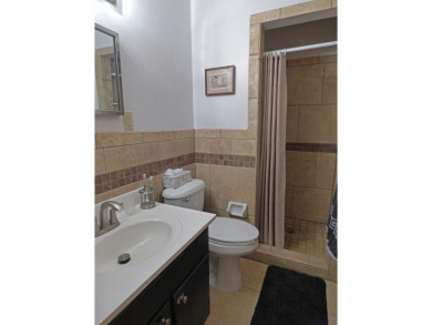 Built for comfort and ease of living, this home on Lake Navajo on Cherokee Village North Course in Arkansas - for sale on GolfHomes.com, golf home, golf lot