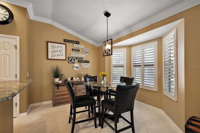 MAGNIFICENT 3/2 Whispering Pine with STUNNING HEATED POOL and on The Links of Spruce Creek in Florida - for sale on GolfHomes.com, golf home, golf lot