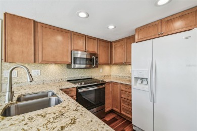Step into Florida living at its finest with this beautifully on Highland Lakes Executive Golf Course in Florida - for sale on GolfHomes.com, golf home, golf lot