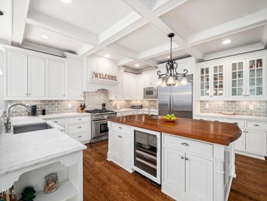 Step into refined luxury with this 6 bed / 5 bath estate on TPC at Wakefield Plantation in North Carolina - for sale on GolfHomes.com, golf home, golf lot