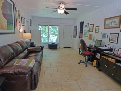 Built for comfort and ease of living, this home on Lake Navajo on Cherokee Village North Course in Arkansas - for sale on GolfHomes.com, golf home, golf lot