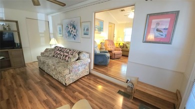 SO MUCH TO OFFER IN THIS ONE BEDROOM, 1 1/2 BATH MOBILE HOME IN on River Run Golf Links in Florida - for sale on GolfHomes.com, golf home, golf lot