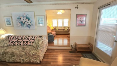 SO MUCH TO OFFER IN THIS ONE BEDROOM, 1 1/2 BATH MOBILE HOME IN on River Run Golf Links in Florida - for sale on GolfHomes.com, golf home, golf lot