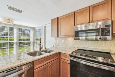 Step into Florida living at its finest with this beautifully on Highland Lakes Executive Golf Course in Florida - for sale on GolfHomes.com, golf home, golf lot