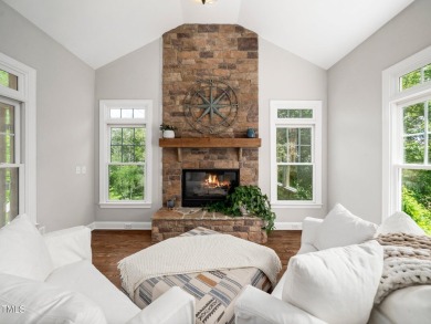 Step into refined luxury with this 6 bed / 5 bath estate on TPC at Wakefield Plantation in North Carolina - for sale on GolfHomes.com, golf home, golf lot