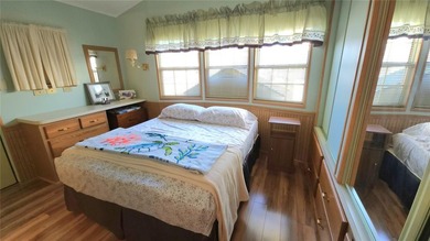 SO MUCH TO OFFER IN THIS ONE BEDROOM, 1 1/2 BATH MOBILE HOME IN on River Run Golf Links in Florida - for sale on GolfHomes.com, golf home, golf lot