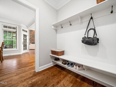 Step into refined luxury with this 6 bed / 5 bath estate on TPC at Wakefield Plantation in North Carolina - for sale on GolfHomes.com, golf home, golf lot
