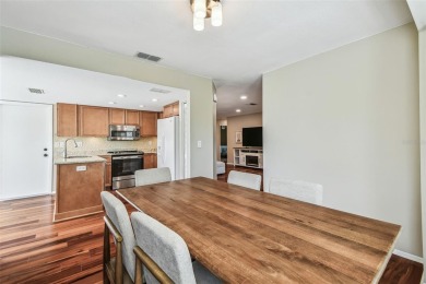 Step into Florida living at its finest with this beautifully on Highland Lakes Executive Golf Course in Florida - for sale on GolfHomes.com, golf home, golf lot