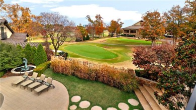 This remarkable estate is located on the 9th green of NWA's on Pinnacle Country Club in Arkansas - for sale on GolfHomes.com, golf home, golf lot
