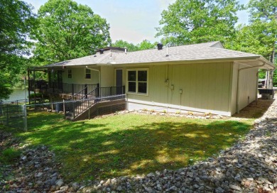 Built for comfort and ease of living, this home on Lake Navajo on Cherokee Village North Course in Arkansas - for sale on GolfHomes.com, golf home, golf lot