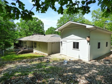 Built for comfort and ease of living, this home on Lake Navajo on Cherokee Village North Course in Arkansas - for sale on GolfHomes.com, golf home, golf lot