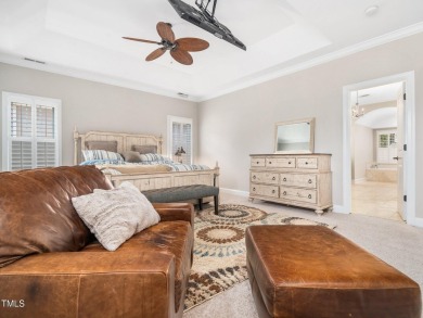 Step into refined luxury with this 6 bed / 5 bath estate on TPC at Wakefield Plantation in North Carolina - for sale on GolfHomes.com, golf home, golf lot
