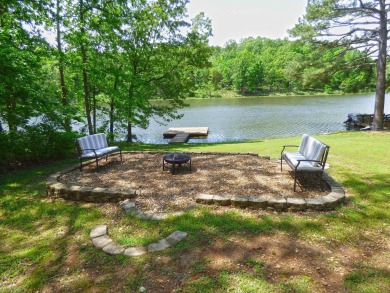 Built for comfort and ease of living, this home on Lake Navajo on Cherokee Village North Course in Arkansas - for sale on GolfHomes.com, golf home, golf lot