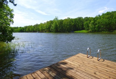 Built for comfort and ease of living, this home on Lake Navajo on Cherokee Village North Course in Arkansas - for sale on GolfHomes.com, golf home, golf lot