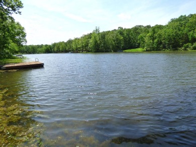 Built for comfort and ease of living, this home on Lake Navajo on Cherokee Village North Course in Arkansas - for sale on GolfHomes.com, golf home, golf lot