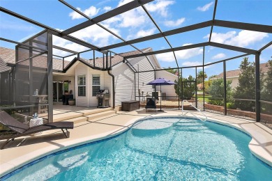 MAGNIFICENT 3/2 Whispering Pine with STUNNING HEATED POOL and on The Links of Spruce Creek in Florida - for sale on GolfHomes.com, golf home, golf lot