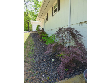 Built for comfort and ease of living, this home on Lake Navajo on Cherokee Village North Course in Arkansas - for sale on GolfHomes.com, golf home, golf lot