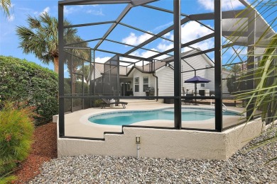 MAGNIFICENT 3/2 Whispering Pine with STUNNING HEATED POOL and on The Links of Spruce Creek in Florida - for sale on GolfHomes.com, golf home, golf lot