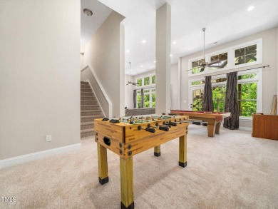 Step into refined luxury with this 6 bed / 5 bath estate on TPC at Wakefield Plantation in North Carolina - for sale on GolfHomes.com, golf home, golf lot
