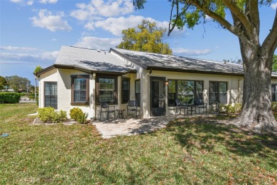 Step into Florida living at its finest with this beautifully on Highland Lakes Executive Golf Course in Florida - for sale on GolfHomes.com, golf home, golf lot